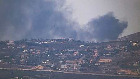 Smoke rises after a strike in an area in Lebanon next to the Israeli-Lebanese border at the Galilee region, as seen from the Israeli-annexed Golan Heights, Sunday, 2024.