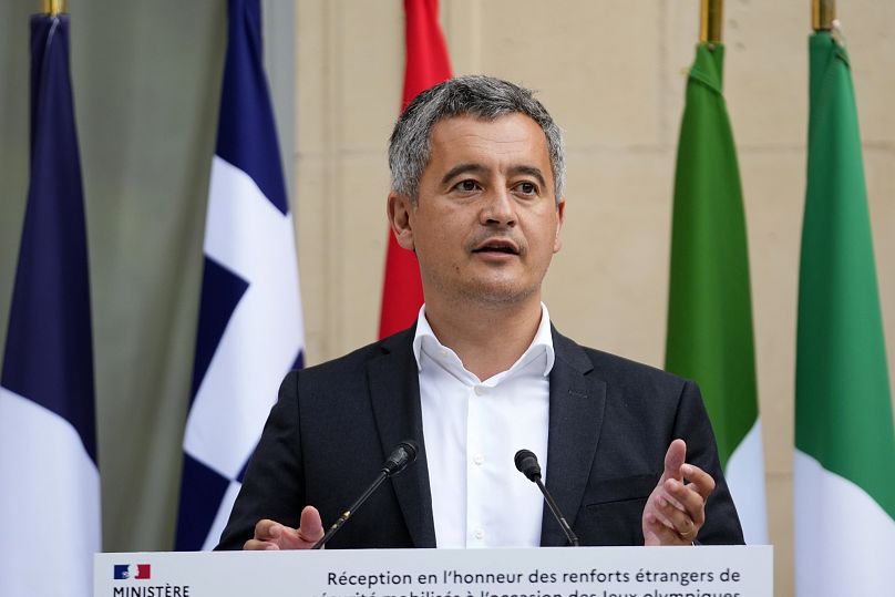 French Interior minister Gerald Darmanin acknowledges members of foreign police forces that help with the security of the 2024 Summer Olympics.