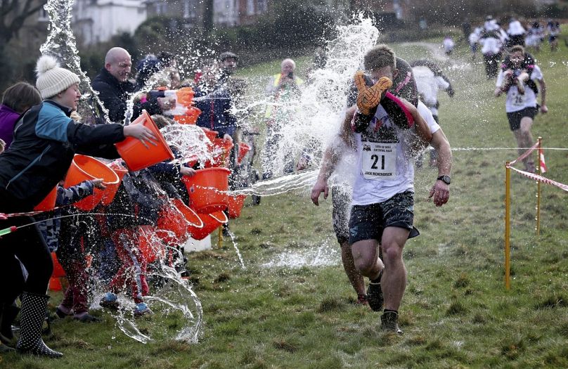 Winners receive a coveted Wife Carrying Championship medal and a barrel of ale. 