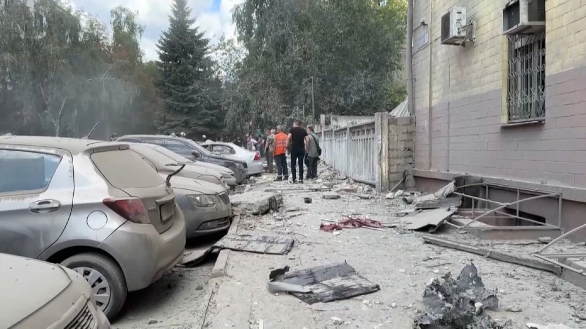 Building and cars in Kharkiv were damaged by the rocket attack.