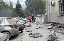 Building and cars in Kharkiv were damaged by the rocket attack.