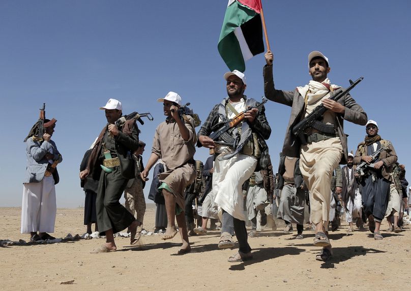 Houthi rebel fighters march during a rally of support for the Palestinians in the Gaza Strip and against the U.S. strikes on Yemen outside Sanaa on Jan. 22, 2024.