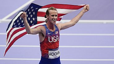 Cole Hocker, of the United States, celebrates winning gold in the men's 1500-meter final at the 2024 Summer Olympics, Tuesday, Aug. 6, 2024