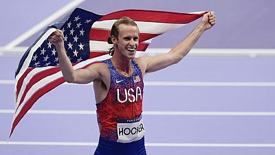 Cole Hocker, of the United States, celebrates winning gold in the men's 1500-meter final at the 2024 Summer Olympics, Tuesday, Aug. 6, 2024