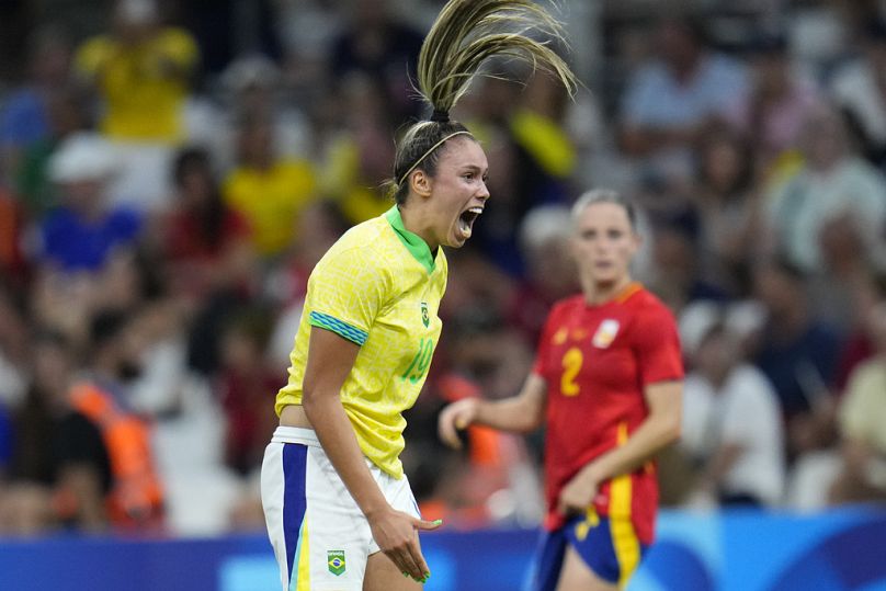 Brazil's Priscila reacts after missing an opportunity to score during a women's semifinal football match between Brazil and Spain