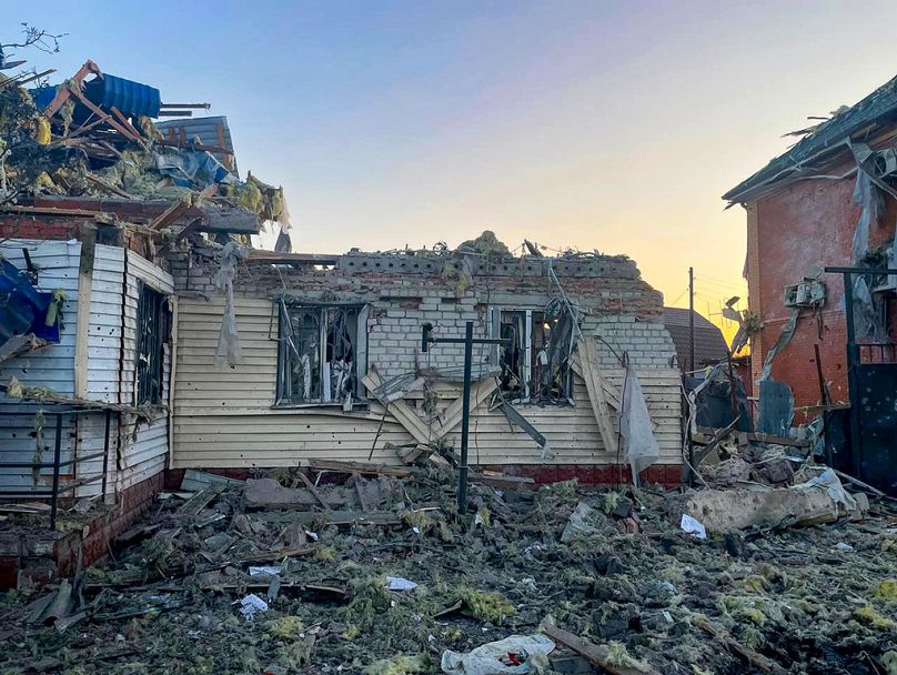 a damaged house after shelling by the Ukrainian side in the city of Sudzha, Kursk region that borders Ukraine, Tuesday, Aug. 6, 2024.