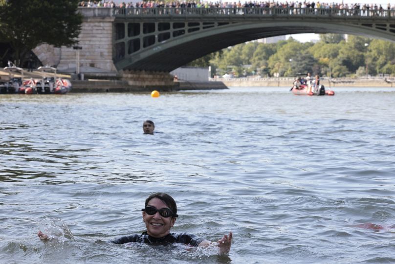 Paris Mayor Anne Hidalgo swims in the Seine river, Wednesday, July 17, 2024 in Paris.