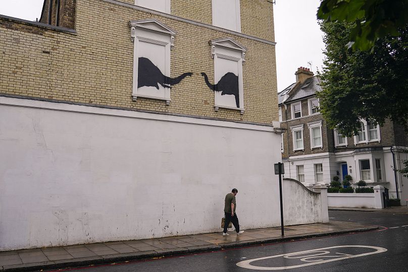 An artwork by the street artist Banksy that appeared in west London, 6 August 2024.