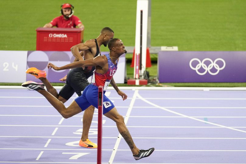 Team US' Quincy Hall crosses the finish line in the final of the men's 400 metres on August 7 2024 in Paris