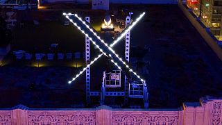 "X" sign atop the company headquarters, formerly known as Twitter, in San Francisco.