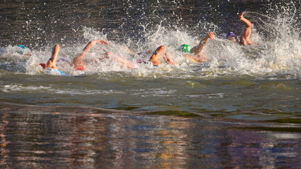 Two Portuguese triathlon athletes fall ill after Seine river swim