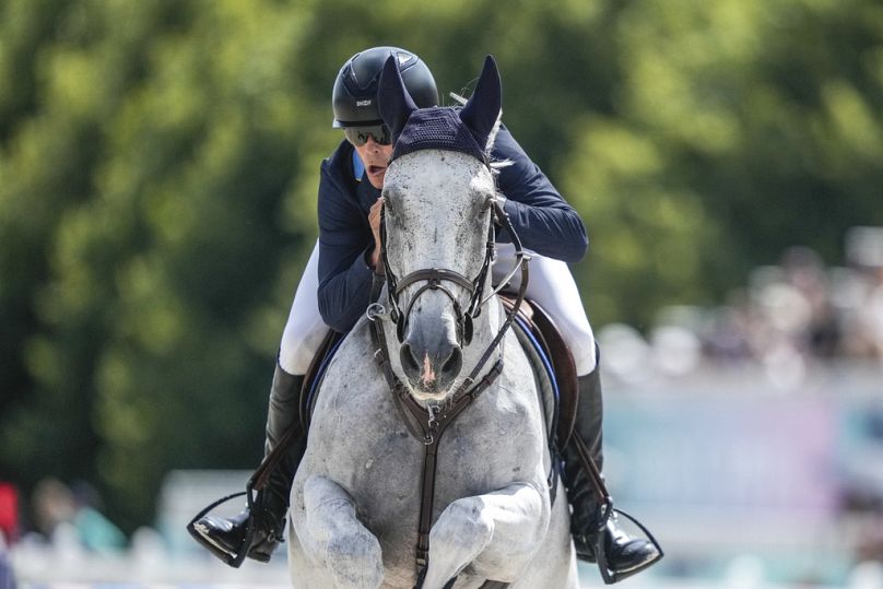 Sweden's Peder Fredricson, riding Catch Me Not S, during the Equestrian Team Jumping competition, at the 2024 Summer Olympics, Thursday, Aug. 1, 2024, in Versailles, France