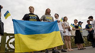 People attend a flash mob to highlight the plight of hundreds of Ukrainian athletes and coaches, both amateur and professional, who were killed as a result of Russia's war in 