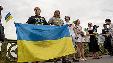 People attend a flash mob to highlight the plight of hundreds of Ukrainian athletes and coaches, both amateur and professional, who were killed as a result of Russia's war in 