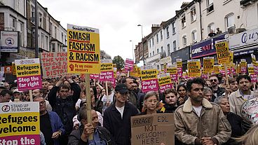 Protesters demonstrate against a planned far-right anti-immigration protest in London, Wednesday, Aug. 7, 2024