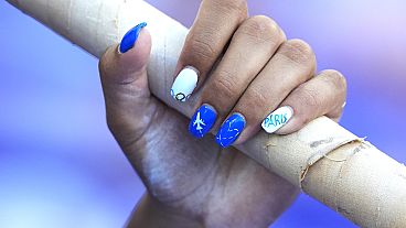 Eleni-Klaoudia Polak, of Greece, prepares for the women's pole vault qualification at the 2024 Summer Olympics.