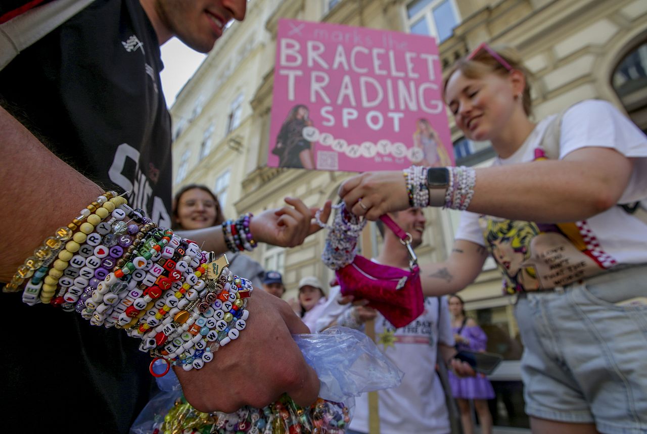 Fans gather at a bracelet trading spot