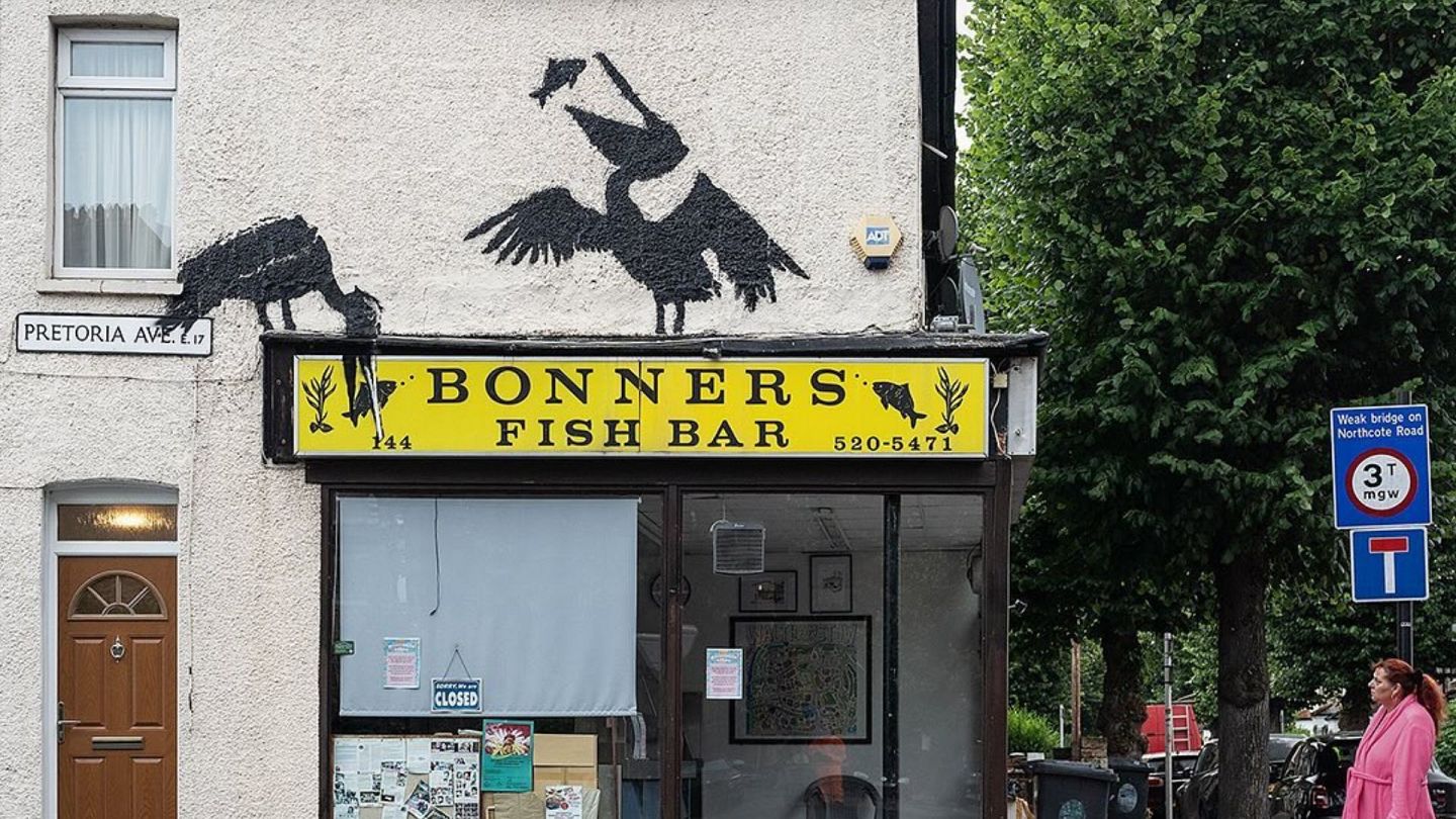 Hungry pelicans: Banksy confirms fifth street art piece of the week above  London chip shop | Euronews
