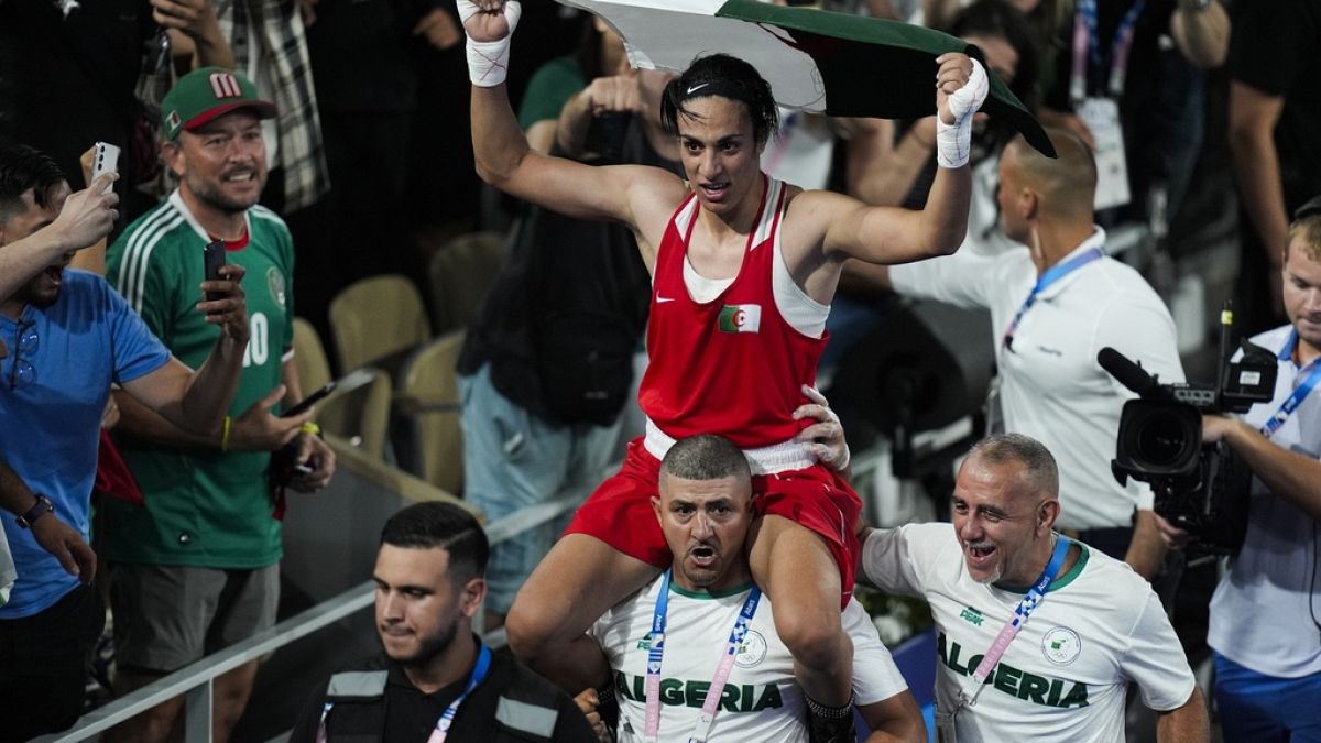 Algeria's Imane Khelif celebrates after defeating China's Yang Liu in their women's 66 kg final boxing match