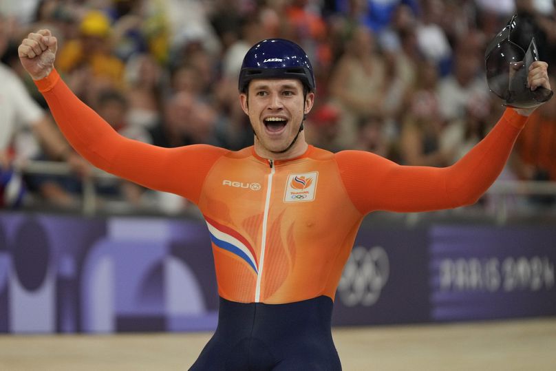 Harrie Lavreysen of Netherlands celebrates winning the gold medal in the men's sprint event, at the Summer Olympics, Friday, Aug. 9, 2024