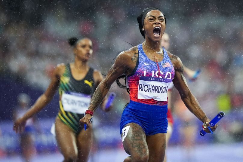 Sha'carri Richardson, of the United States, celebrates after winning the women's 4 x 100-meter relay final at the 2024 Summer Olympics, Friday, Aug. 9, 2024, in Paris