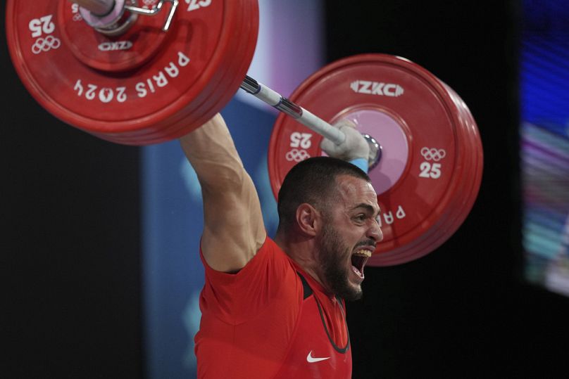 Karlos Nasar in the weightlifing final