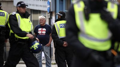 Police forces secure the area ahead of a far-right anti-immigration protest in Newcastle, England, Saturday, Aug. 10, 2024