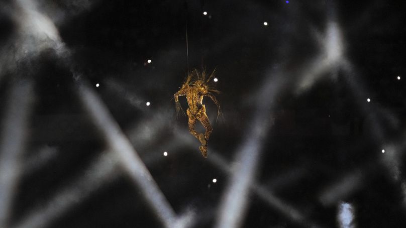 A performer arrives during the 2024 Summer Olympics closing ceremony at the Stade de France, Sunday, Aug. 11, 2024, in Saint-Denis, France