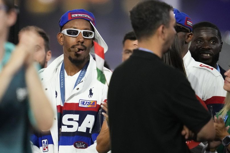 Le reazione degli atleti durante la cerimonia di chiusura delle Olimpiadi estive 2024 allo Stade de France, domenica 11 agosto 2024