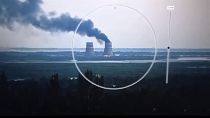 Smoke rises from a cooling tower of the Zaporizhzhia Nuclear Power Station in a Russia-controlled area in the Energodar, Zaporizhzhia region of Ukraine.