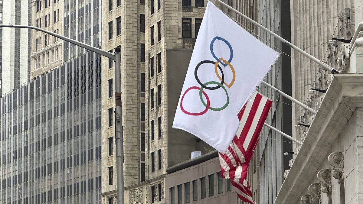 The Olympic and American flags on display at the New York Stock Exchange during the Paris Olympics 2024