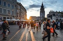 Tourists in Main Market Square Kraków, Poland