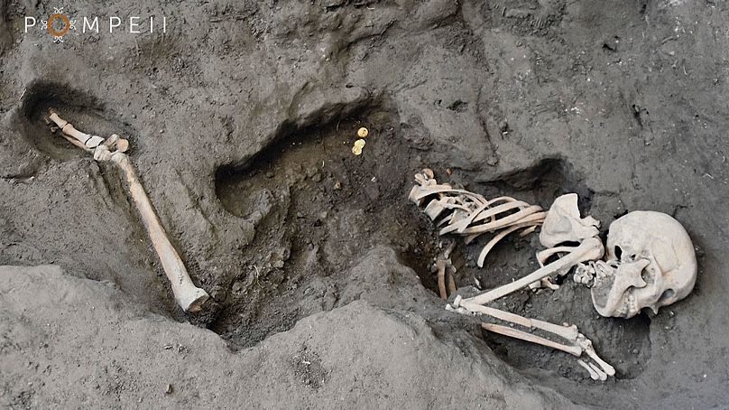 The woman’s skeleton found alongside coins and jewellery  