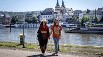 Freed Russian artist Sasha Skochilenko and her partner, Sonya Subbotina, walk at the banks of the Mosel River in Koblenz. Freed Russian artist Sasha Skochilenko and her partner, Sonya Subbotina, walk at the banks of the Mosel River in Koblenz.