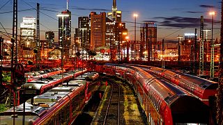 Trains are parked outside the central train station in Frankfurt, Germany, Wednesday, Aug. 11, 2021.