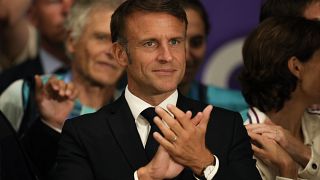 Macron aplaude durante un evento de los Juegos Olímpicos a comienzos de agosto.