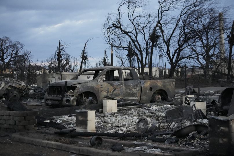 Wildfire wreckage is shown Thursday, 10 August, 2023, in Lahaina, Hawaii.