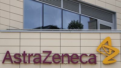 In this Saturday, July 18, 2020 file photo a general view of AstraZeneca offices and the corporate logo in Cambridge, England. 