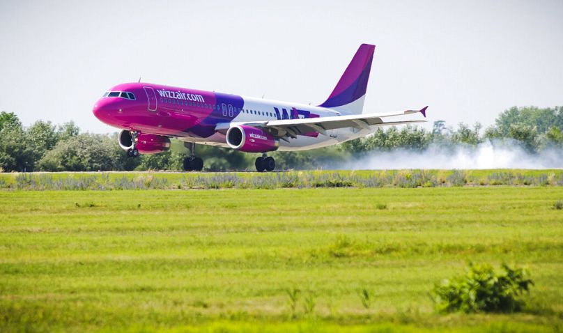 A Wizz Air flight takes off from London Luton Airport