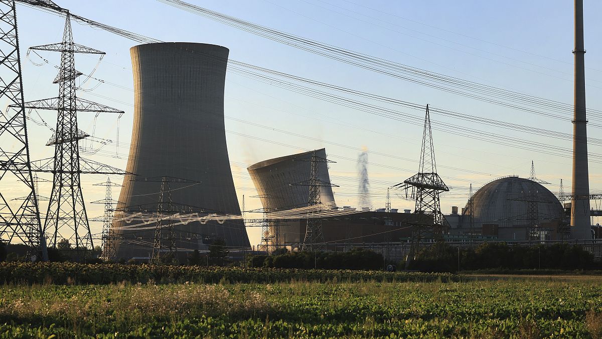 The first cooling tower of the decommissioned nuclear power plant collapses during a controlled demolition in Grafenrheinfeld, August 16, 2024