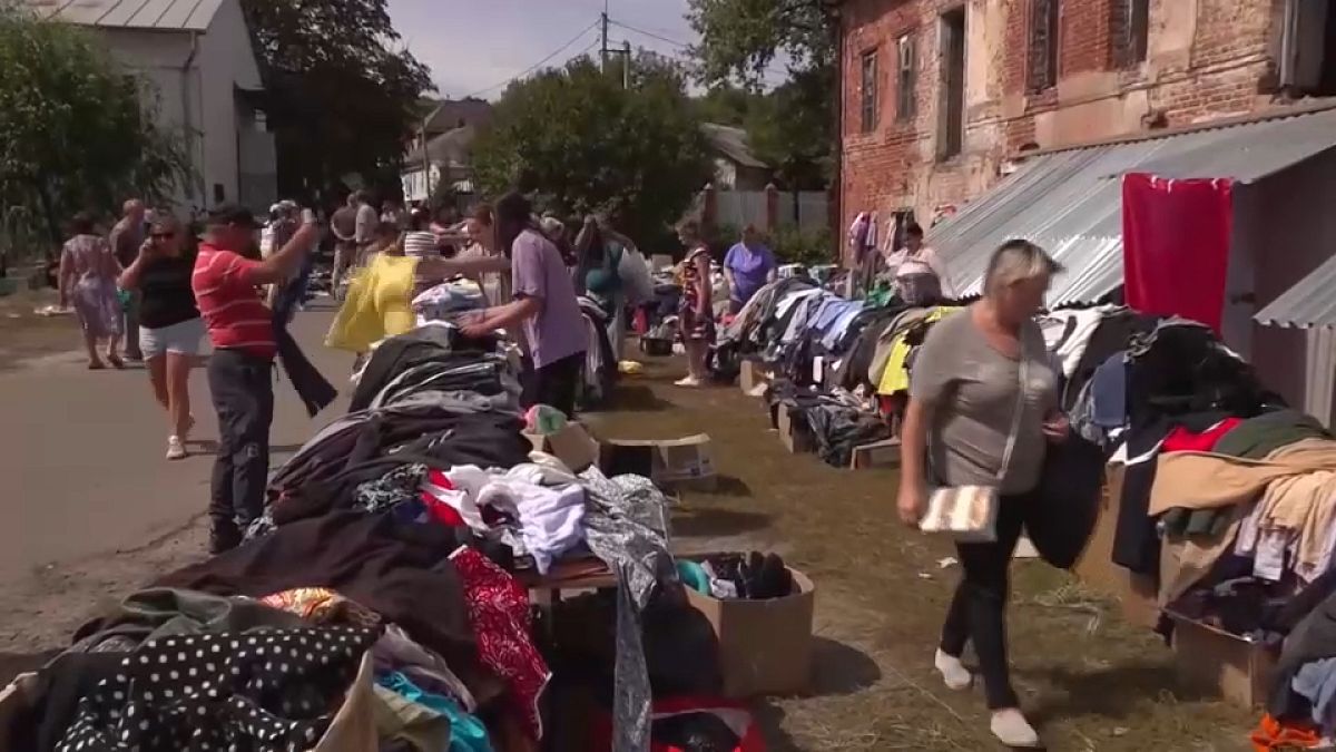 People begin to move their belongings from homes in Russia's Kursk region, August 17, 2024