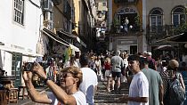 Tourists visit the old Lisbon centre of Sintra, Portugal, Friday, August 9, 2024.