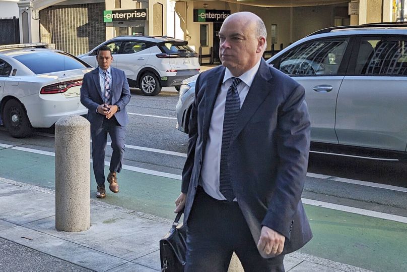 Mike Lynch walks into court in San Francisco on March 26, 2024.