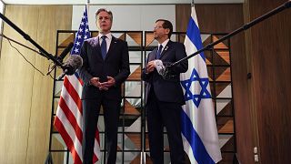 U.S. Secretary of State Antony Blinken, left, meets with Israel's President Isaac Herzog, in Tel Aviv, Israel, Monday, Aug. 19, 2024.