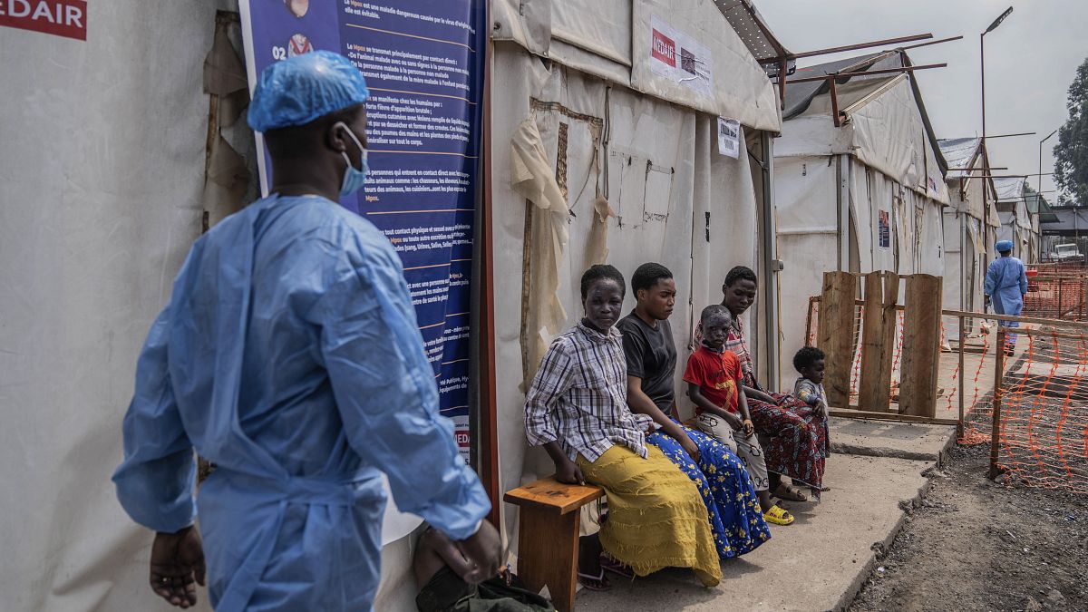 Children suffering from mpox wait for a treatment at a clinic in Munigi, eastern Congo.