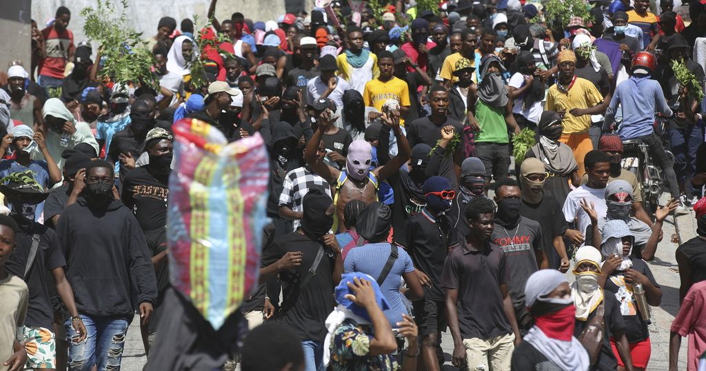 Haitian police tear-gas peaceful protesters as they demand help in stopping gangs