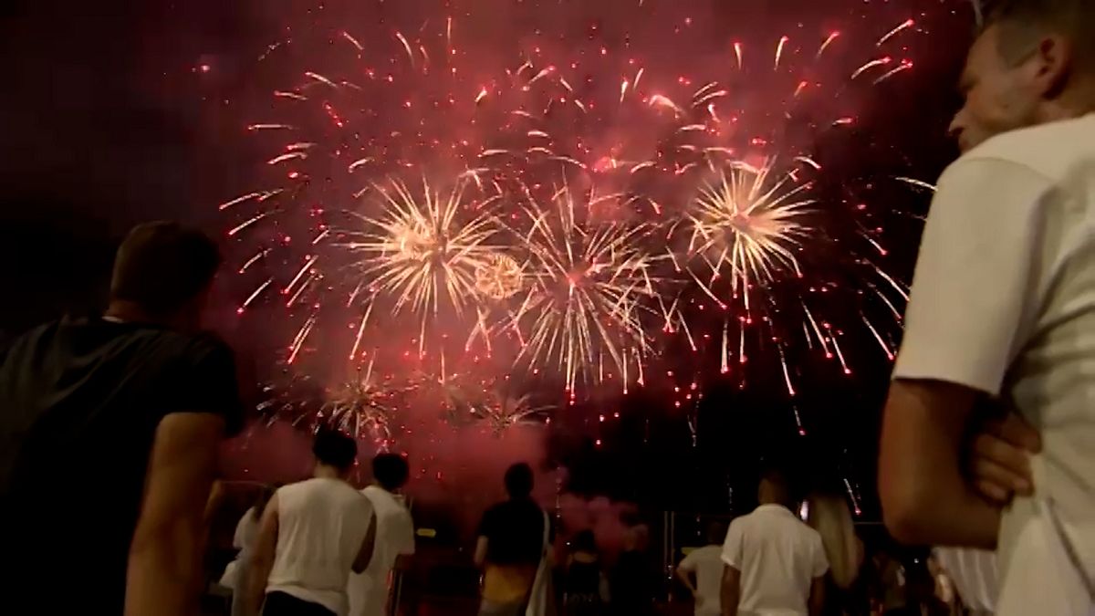 Onlookers of the Saint Stephen's Day firework display in Budapest, Hungary, on Tuesday, August 20, 2024.