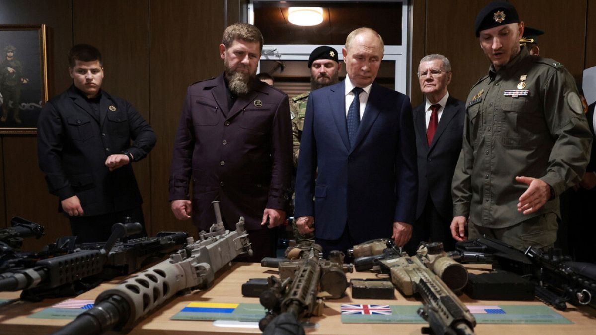 Putin praises Chechen fighters set for Ukraine in surprise visit