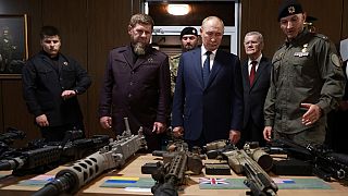 Russian President Vladimir Putin, accompanied by head of the Chechen Republic Ramzan Kadyrov inspects NATO military trophies captured in the battles in Ukraine, Aug. 2024.  