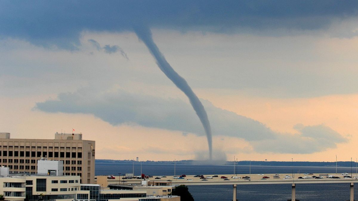 A large waterspout forms above the St. Johns River in Jacksonville, Florida, June 2009.